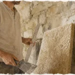 Isoler un mur en pierre avec isolation perspirante et enduit à la chaux
